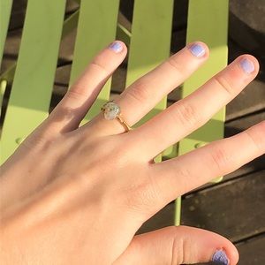 Green and clear stone ring